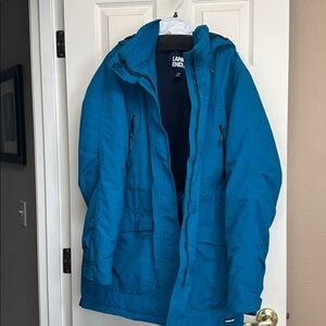 Lands end heavy duty warm coat. Lots of pockets in a vibrant blue hue